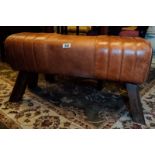 Leather and mahogany Pommel horse in the form of a foot stool.