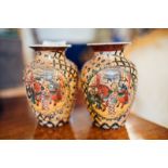 Pair of hand painted Japanese vases.