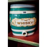 Green ceramic Whisky dispenser.