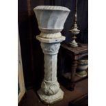 Pair of 19th. C. white marble urns raised on stands with turned columns and acanthus leaves.