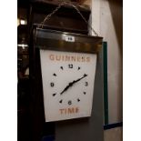 1940s Guinness chrome and Perspex hanging clock.