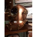 Copper diver's helmet.