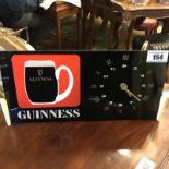Guiness advertising counter clock.
