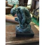 Bronze study of a crouching man on a marble base 5" W x 7" D x 8"