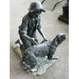 Bronze of a boy washing his dog 24" W x 30"H