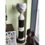 Classical design white and black marble urn standing on a plinth on a stepped circular base 17" W x