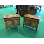 A decorative pair of side cabinets with profuse inlay depicting Roman classical ruins on the tops