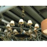 Ex Shelbourne Hotel Very stylish brass and green patinated 10 branch light fittings decorated with