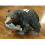 Hand carved wooden bear with fish in its mouth 8" tall