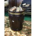 Large Irish mahogany Gothic style brass bound peat bucket.