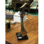 Abstract anchor shaped bronze sculpture on a marble base 21" H