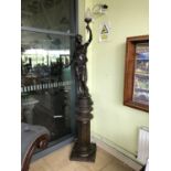 Bronze figure of lady holding lamp on matching pedestal 18" W x 18" D x 98" H