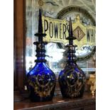 Pair Bristol blue and gilt bottles 8" W x24" H