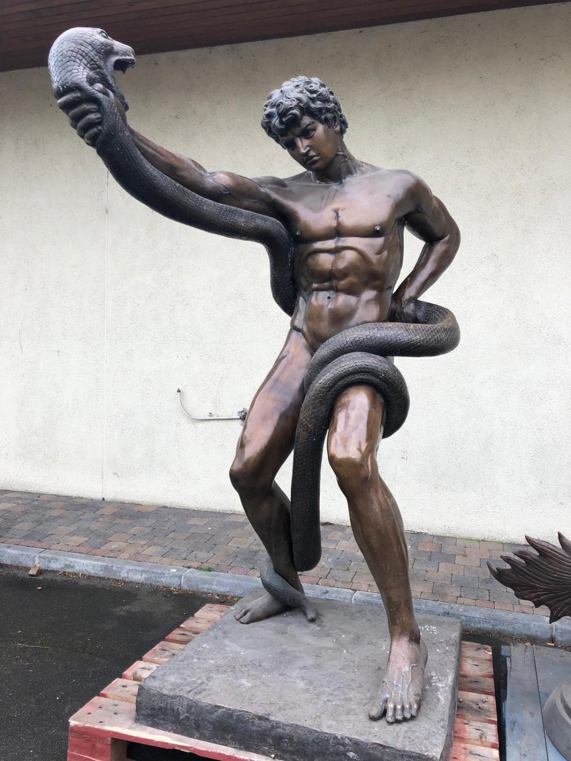 After Lord Frederic Leighton Stunning bronze of an athlete wrestling with a python 78" H