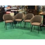 A set of 4 designer leather and metal armchairs with geometrical pattern upholstery