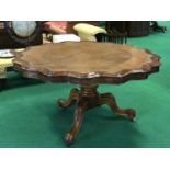 Victorian walnut shaped top centre table on pod base 39" W x 29" H