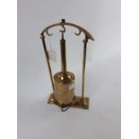 19th. C. brass spit on stand.