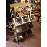 1950's three tier metal display stand with 6 original biscuit tins.