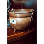 Miniature hand beaten copper cauldron.