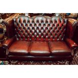 Ox - blood chesterfield sofa.