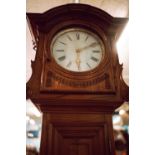 Late 18th C. carved oak long cased clock with original brass and glass dial.