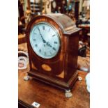 Edwardian inlaid mahogany single Fusee bracket clock with single dial raised on brass lion paw feet