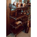 Carved mahogany four tiered whatnot.