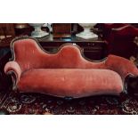 Victorian carved rosewood chaise longue on cabriole legs.