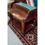 Edwardian rosewood and brass inlaid book trough.