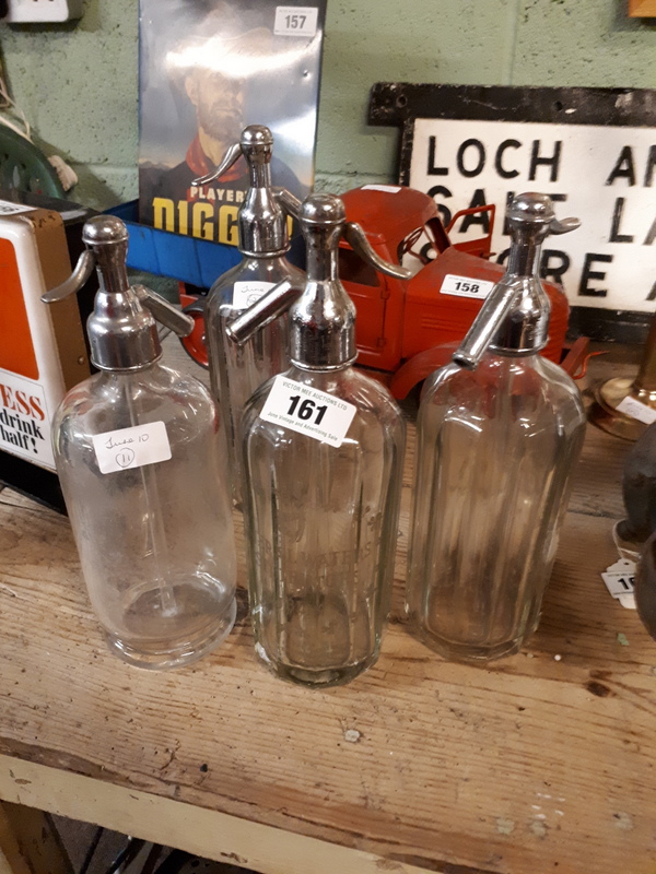 Collection of four early 20th.C. Dublin soda siphons.