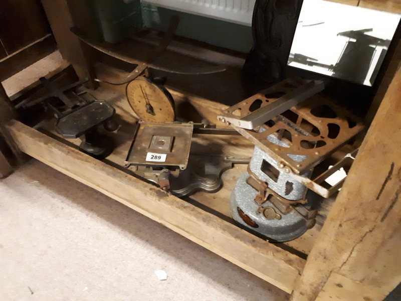 Selection of early 20th C. post office scales and stove.