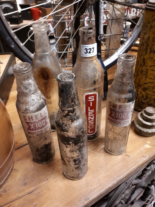 Five early 20th C. Shell oil bottles.