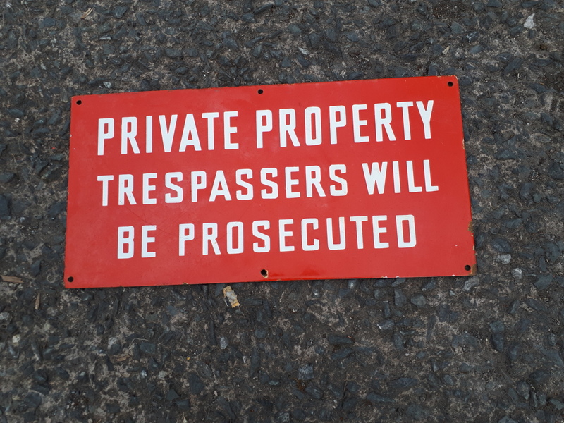 Private Property Trepassers Will Be Prosecuted enamel advertiising sign.