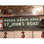 St Johns Road bi-lingual enamel road sign {30 cm H x 90 cm W}.