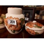 Two pieces of Moorcroft - lidded jar and cream jar (15cm).