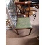 1970's Mahogany folding chair with lyre back.