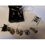 Six silver charms and a pig charm, 9ct. Gold Wish- bone brooch and pair of 9ct gold drop earrings