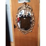 Decorative gild wood wall mirror in the Rocco manner. (144 cm h x 70 cm w)