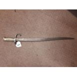 19th C brass and metal French bayonet.