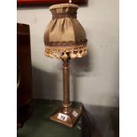 Small 1950's brass lamp with fluted column and silk shade.