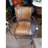 Pair of leather and metal armchairs.