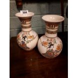 Pair of ceramic Oriental vases. (23 cm h).