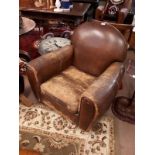 Pair of 1930's leather tub chairs.