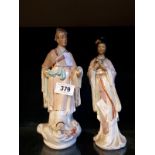 Late 19th. C. figures of Oriental Man and Lady. (30 cm h).