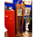 Mahogany granddaughter clock with brass dial. (188 cm h x 48 cm w)