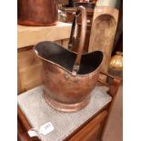 Copper coal holder.