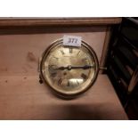 Alexander V Humbolt 1906 Brass ship's clock. (10 cm H x 17 cm w)