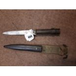 Rifle bayonet with original scabbard.