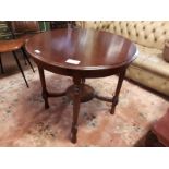 Edwardian mahogany centre table with four turned legs. (71 cm h x 73 cm w)