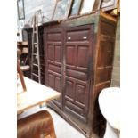 18th. C. pine cupboard with two long doors with raised panels in original paint.(200 cm h x 136 cm w
